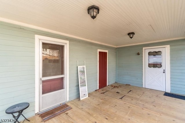 doorway to property with a porch