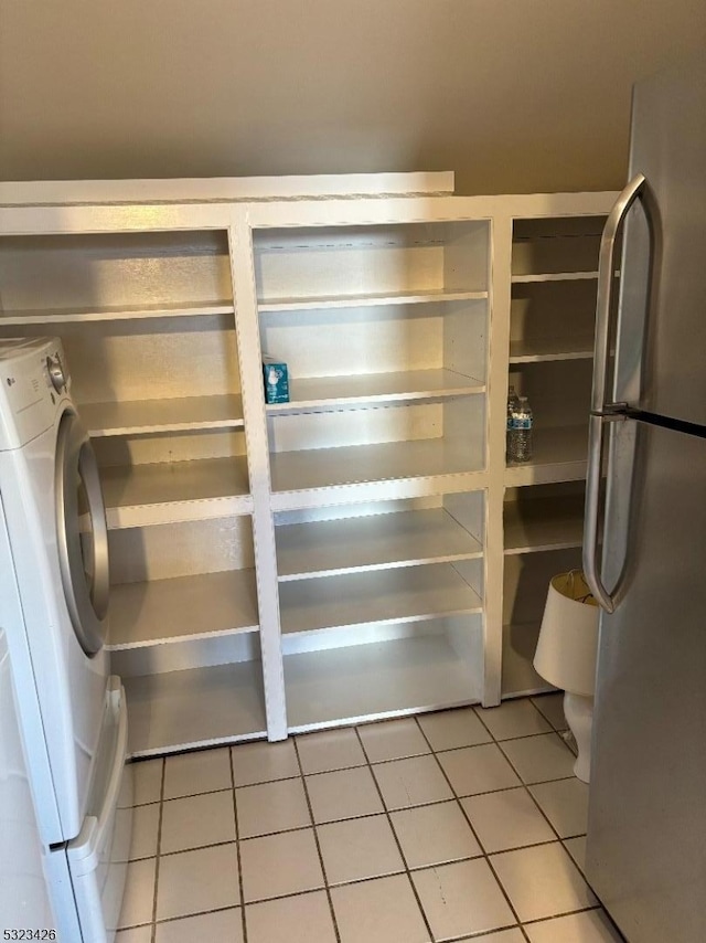 pantry with washer / clothes dryer