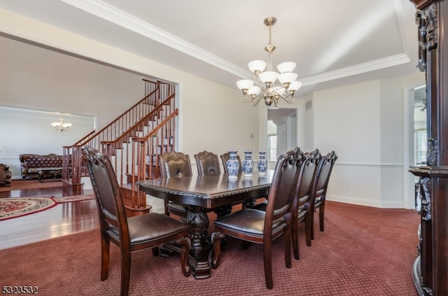 dining space featuring ornamental molding, a notable chandelier, and wood-type flooring