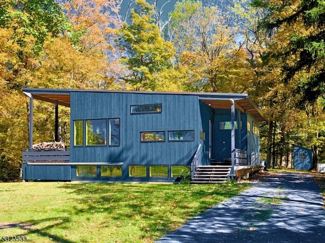 exterior space with a front lawn