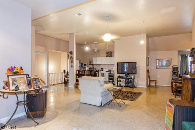 living room with ceiling fan