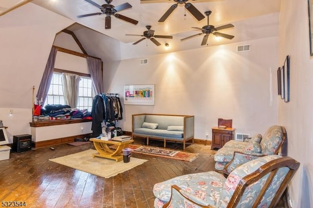 living room with dark hardwood / wood-style floors and ceiling fan