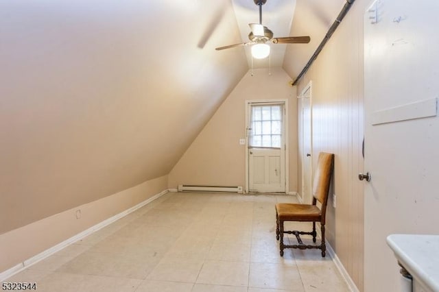 bonus room featuring a baseboard radiator, ceiling fan, and lofted ceiling