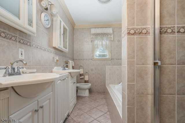 bathroom featuring tile patterned floors, tile walls, and ornamental molding