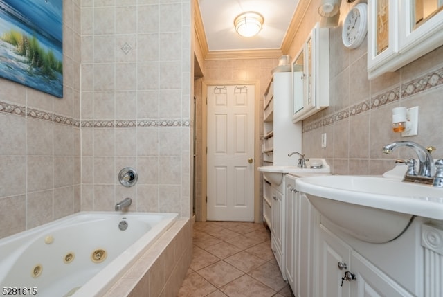 bathroom with tile walls, tile patterned flooring, vanity, and a relaxing tiled tub