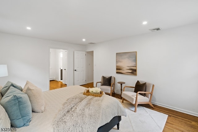 bedroom featuring wood-type flooring