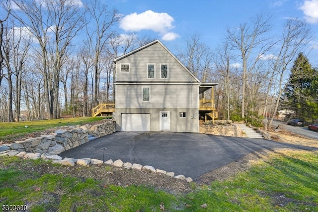 view of property exterior featuring a garage