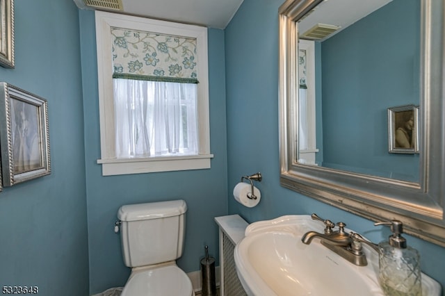 bathroom with toilet and sink