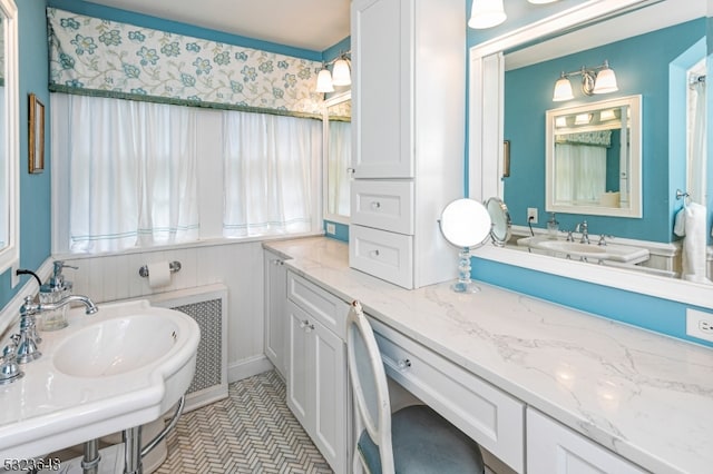 bathroom with tile patterned floors and sink