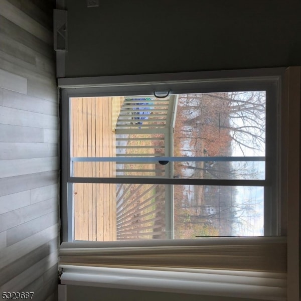 interior details featuring wood walls