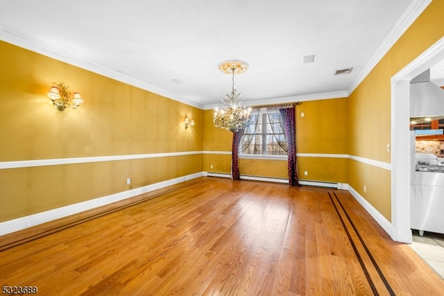 unfurnished dining area with baseboard heating, hardwood / wood-style floors, a notable chandelier, and crown molding