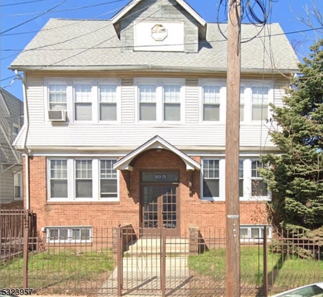 view of front of house with cooling unit