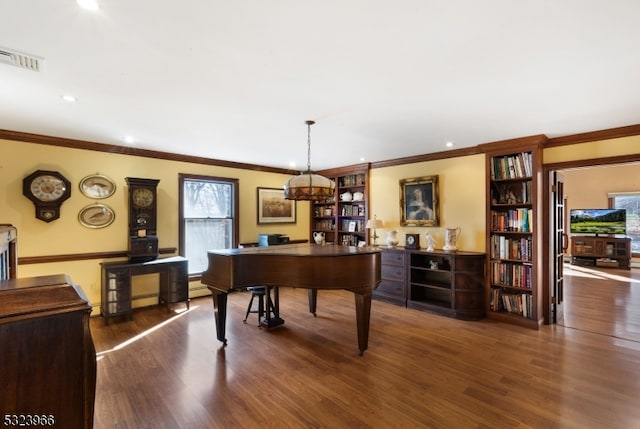 interior space with crown molding and hardwood / wood-style floors