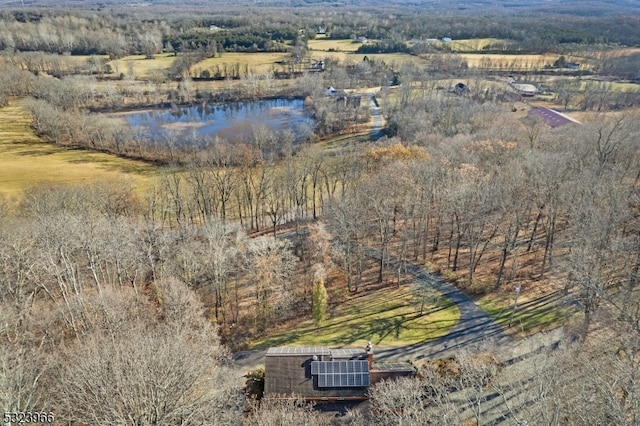 drone / aerial view featuring a rural view and a water view