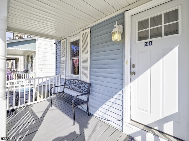 wooden terrace with covered porch