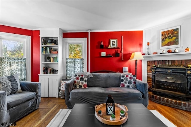 living room with a wealth of natural light and crown molding