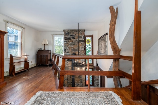 staircase featuring hardwood / wood-style flooring