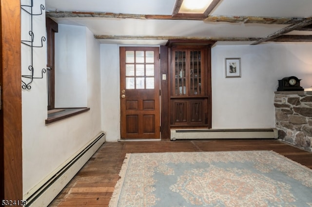 foyer featuring dark hardwood / wood-style floors and a baseboard heating unit