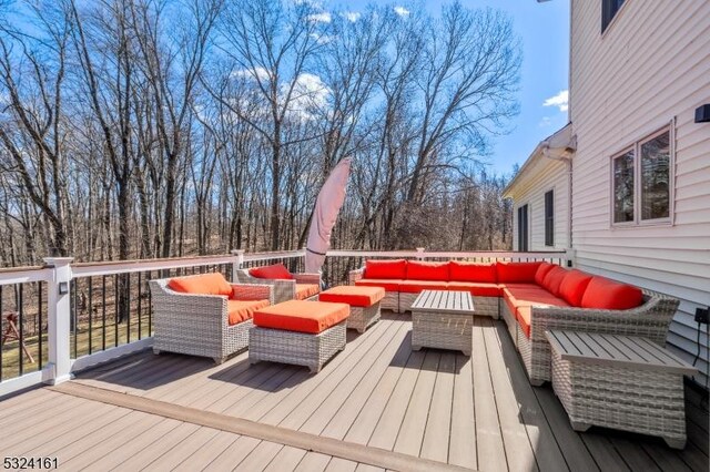 deck featuring an outdoor living space