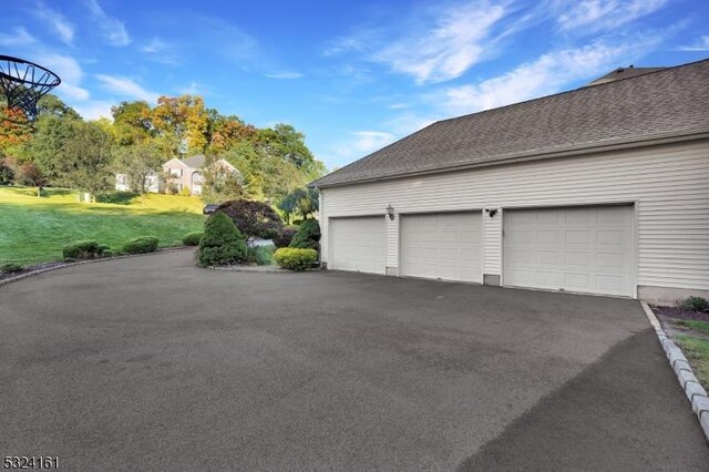 garage with driveway