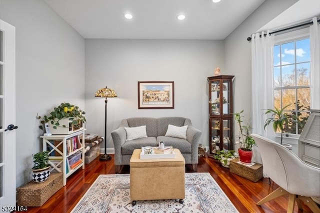 living area featuring dark hardwood / wood-style flooring