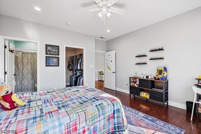 bedroom featuring dark hardwood / wood-style flooring, ceiling fan, and a closet