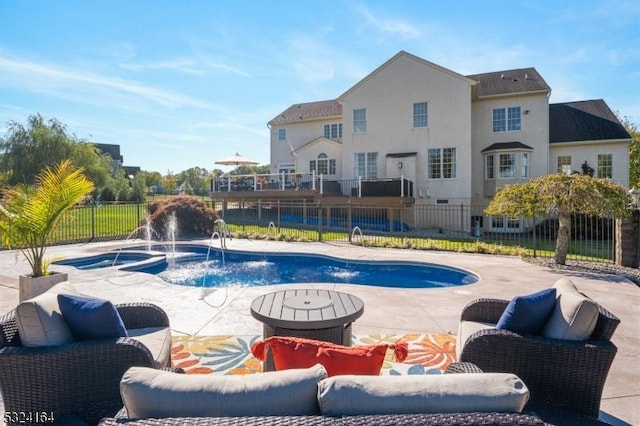 view of pool with pool water feature