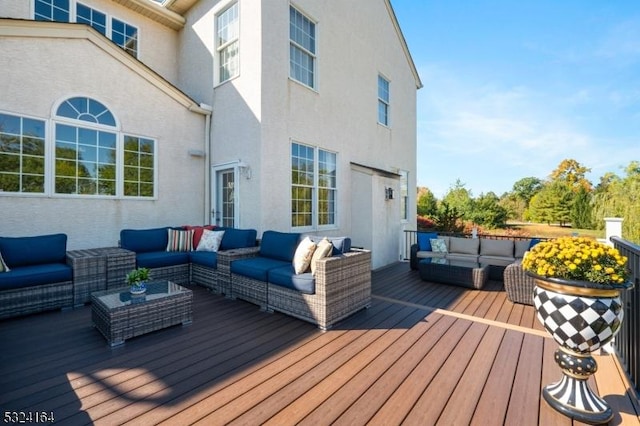 deck featuring an outdoor living space