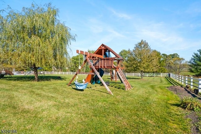 view of play area with a yard