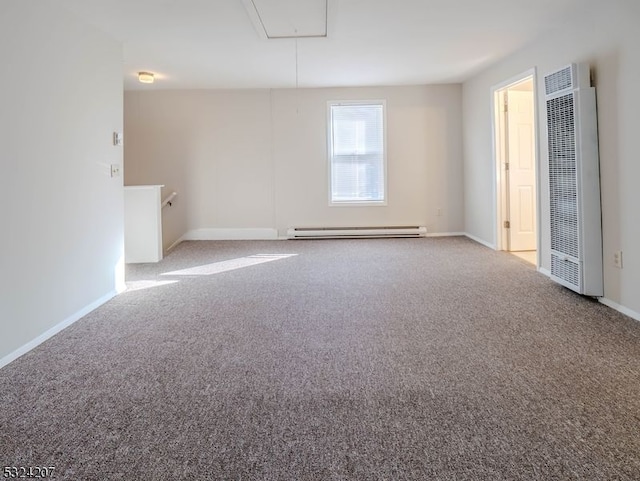 unfurnished room featuring heating unit, light carpet, and a baseboard heating unit