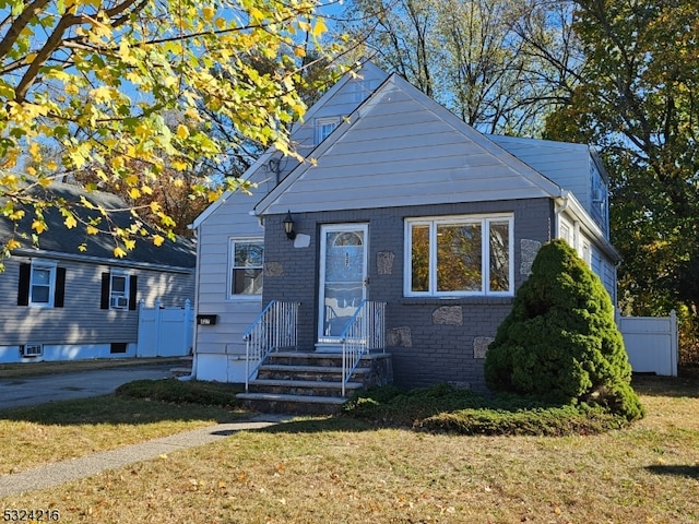 bungalow with a front lawn