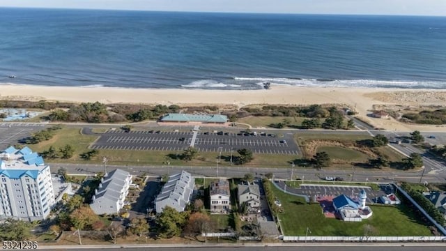 aerial view with a beach view and a water view