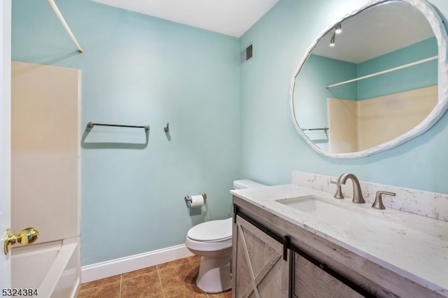 full bathroom with tile patterned floors, vanity, shower / bathtub combination, and toilet