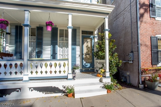 entrance to property with covered porch