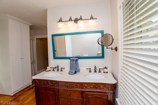 bathroom featuring hardwood / wood-style floors and vanity