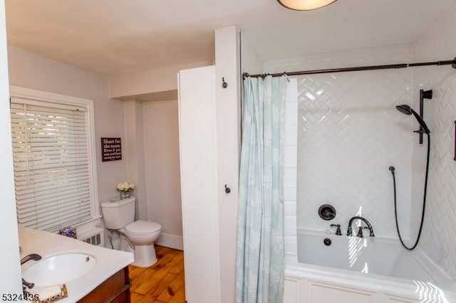 full bathroom featuring toilet, vanity, shower / bath combination with curtain, and hardwood / wood-style flooring