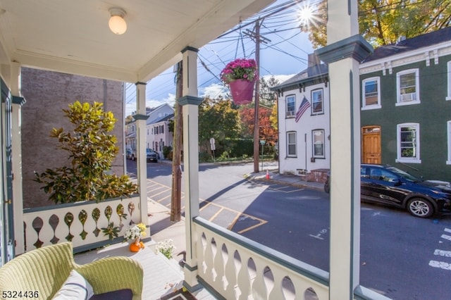 view of patio featuring a porch