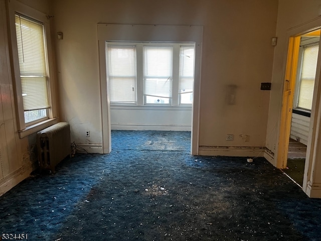 spare room with radiator