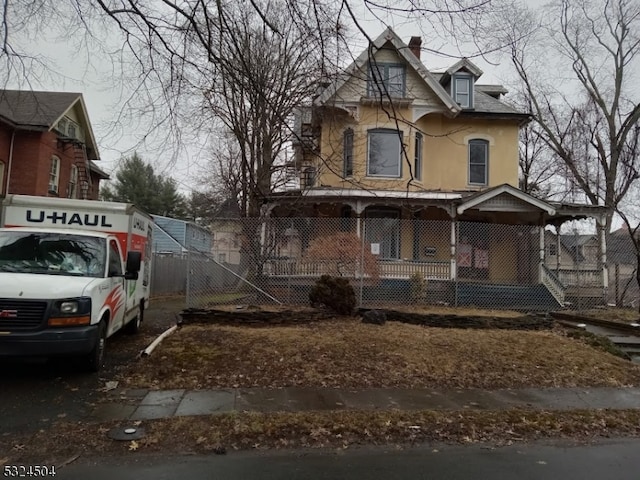 victorian home featuring a porch