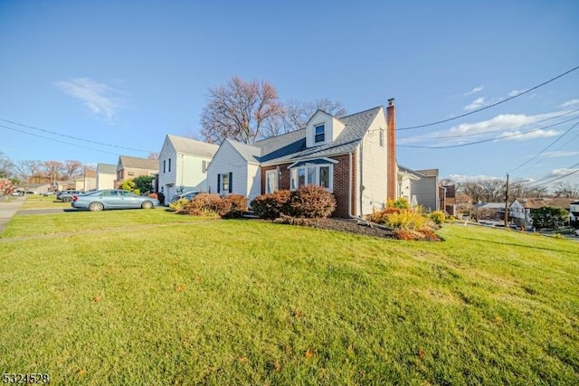 view of side of property featuring a yard