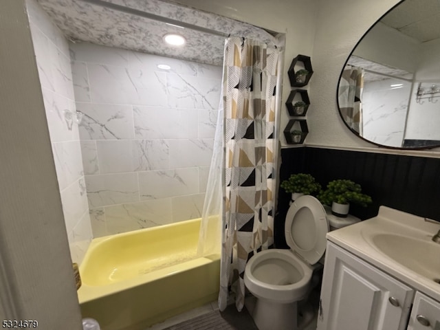 full bathroom featuring shower / bath combination with curtain, vanity, and toilet