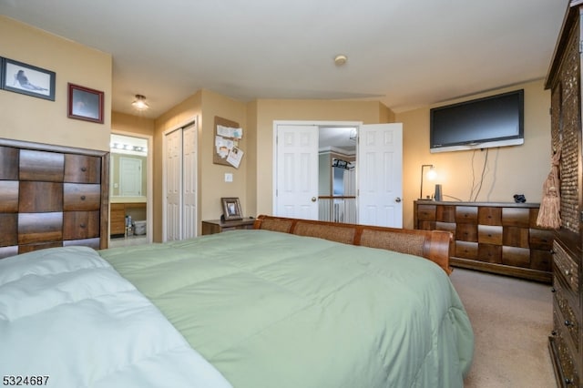 bedroom featuring light colored carpet