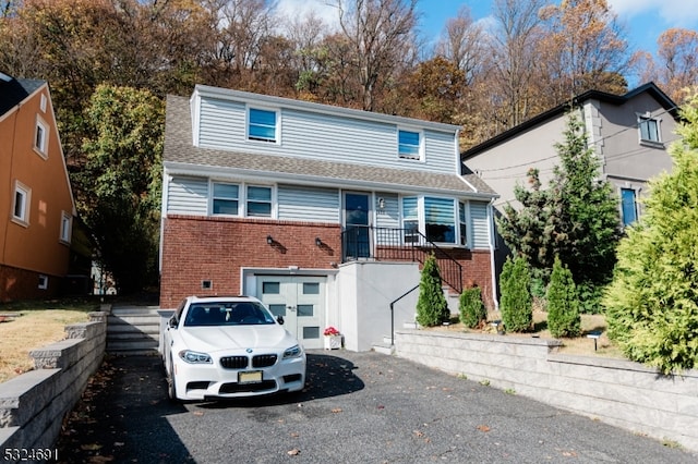 view of property featuring a garage