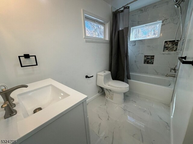 full bathroom with toilet, vanity, shower / tub combo with curtain, and a wealth of natural light