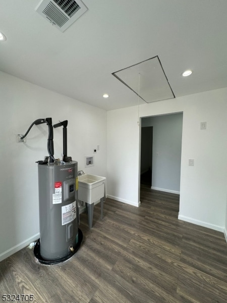 utility room with water heater