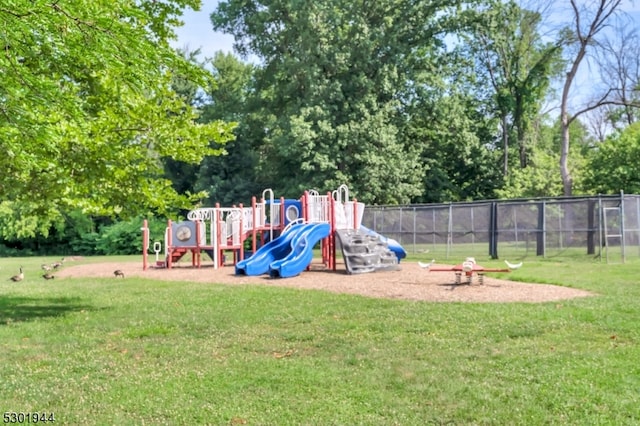 view of playground with a yard