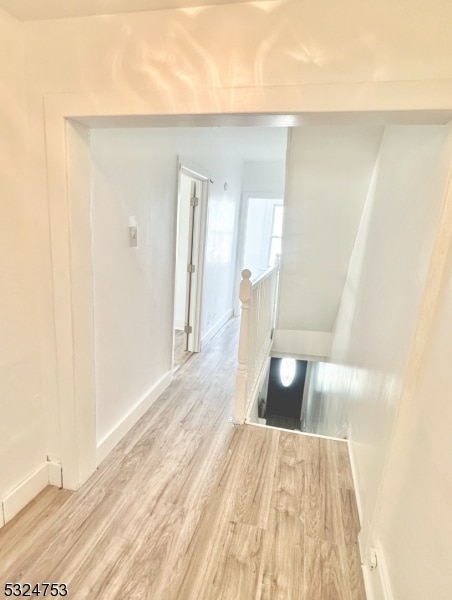 hall featuring light hardwood / wood-style flooring