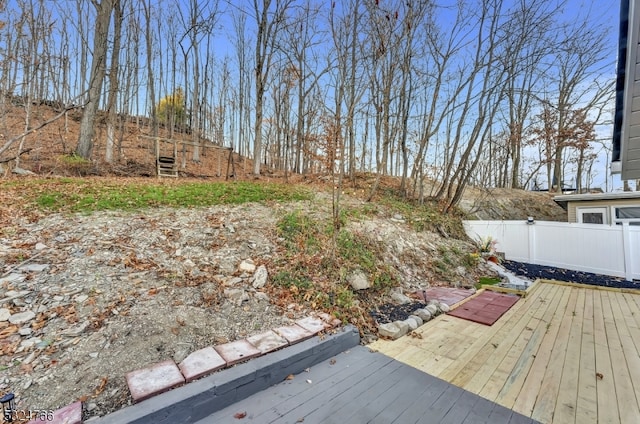 view of yard featuring a wooden deck