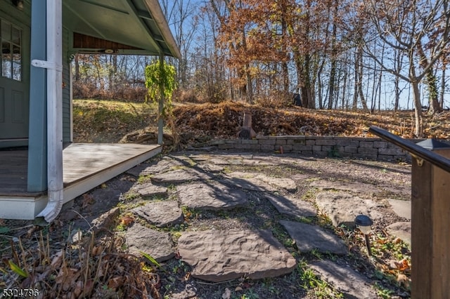 view of yard featuring a wooden deck