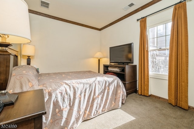 carpeted bedroom featuring crown molding